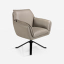 Sillón giratorio piel gris oscuro sobre fondo gris de estudio