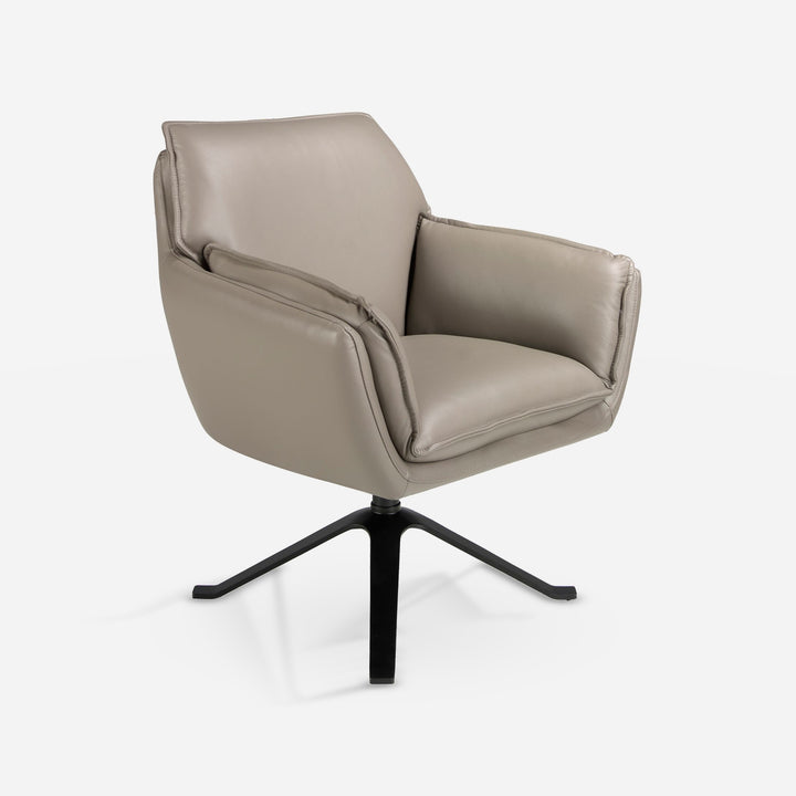 Sillón giratorio piel gris oscuro sobre fondo gris de estudio
