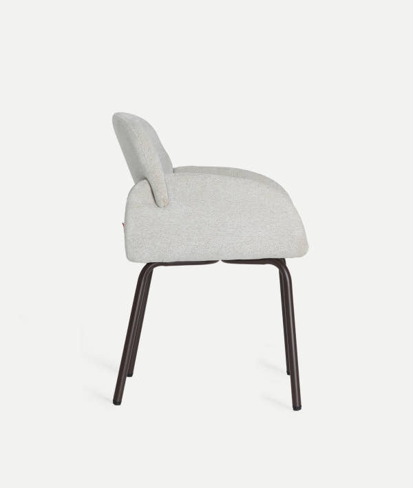 NOOR CHAIR: Enveloping silhouette and contemporary warmth