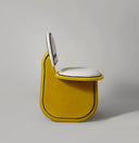 silla tapizada color amarillo y blanco posmoderna maximalista para comedor
