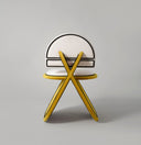 silla tapizada color amarillo y blanco posmoderna maximalista para comedor