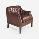 Sillón Chester piel marrón coñac sobre fondo gris