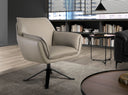 sillón ejecutivo compacto en piel gris oscuro con diseño envolvente y base giratoria de cuatro patas


