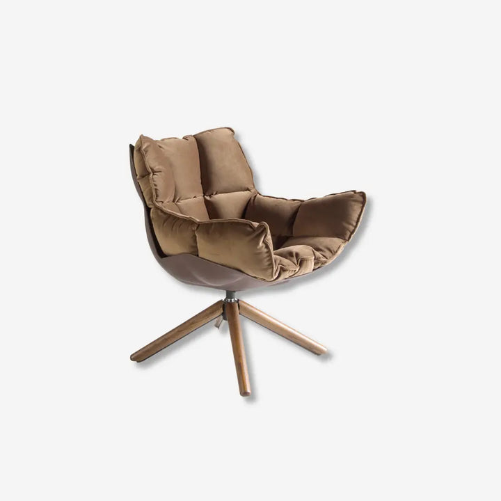 sillón moderno en terciopelo marrón con base giratoria en acabado metálico oscuro