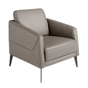 sillón moderno con tapizado en piel color gris topo y patas metálicas negras, estilo atemporal


