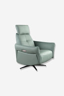 Sillón relax giratorio piel verde turquesa sobre fondo gris de estudio