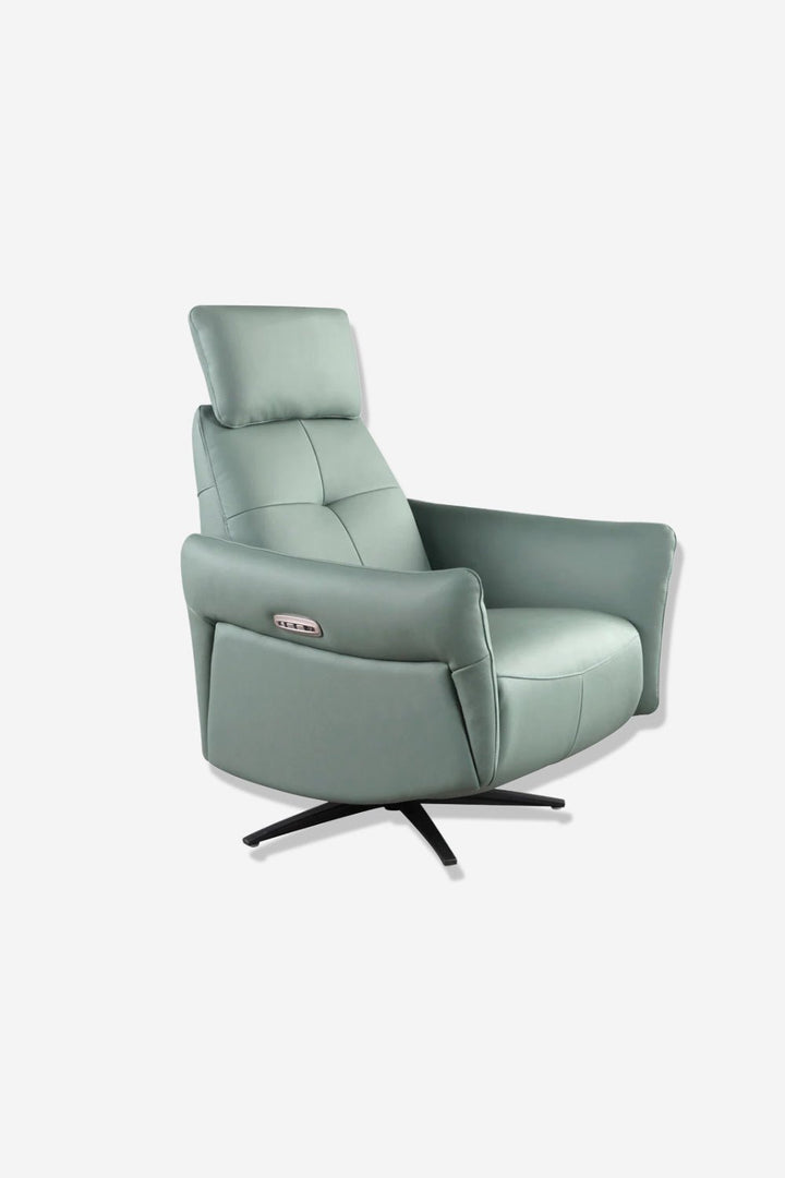 Sillón relax giratorio piel verde turquesa sobre fondo gris de estudio