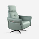 Sillón relax giratorio piel verde turquesa sobre fondo gris de estudio