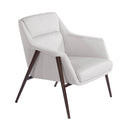 sillón relax de diseño limpio tapizado en tela clara con patas de hierro negro