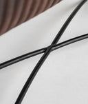 Reposapiés GLADYS tapizado en cuero marrón de alta calidad